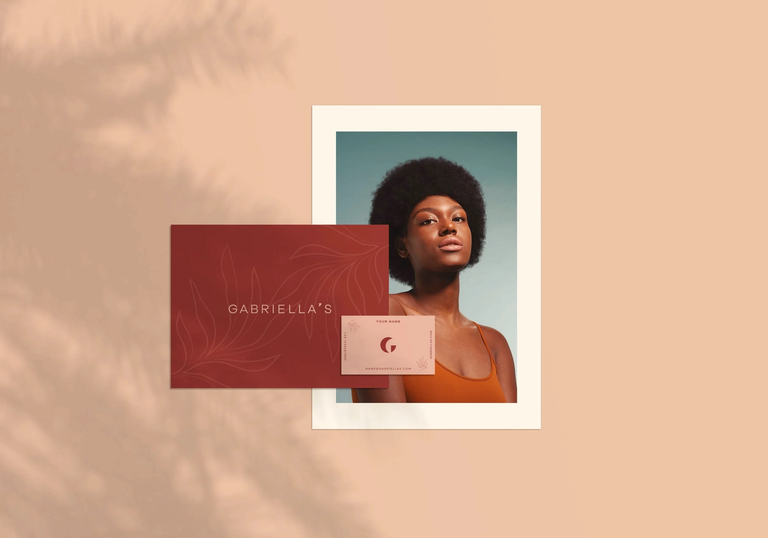 Gabriella's business card and a framed portrait photo mockup